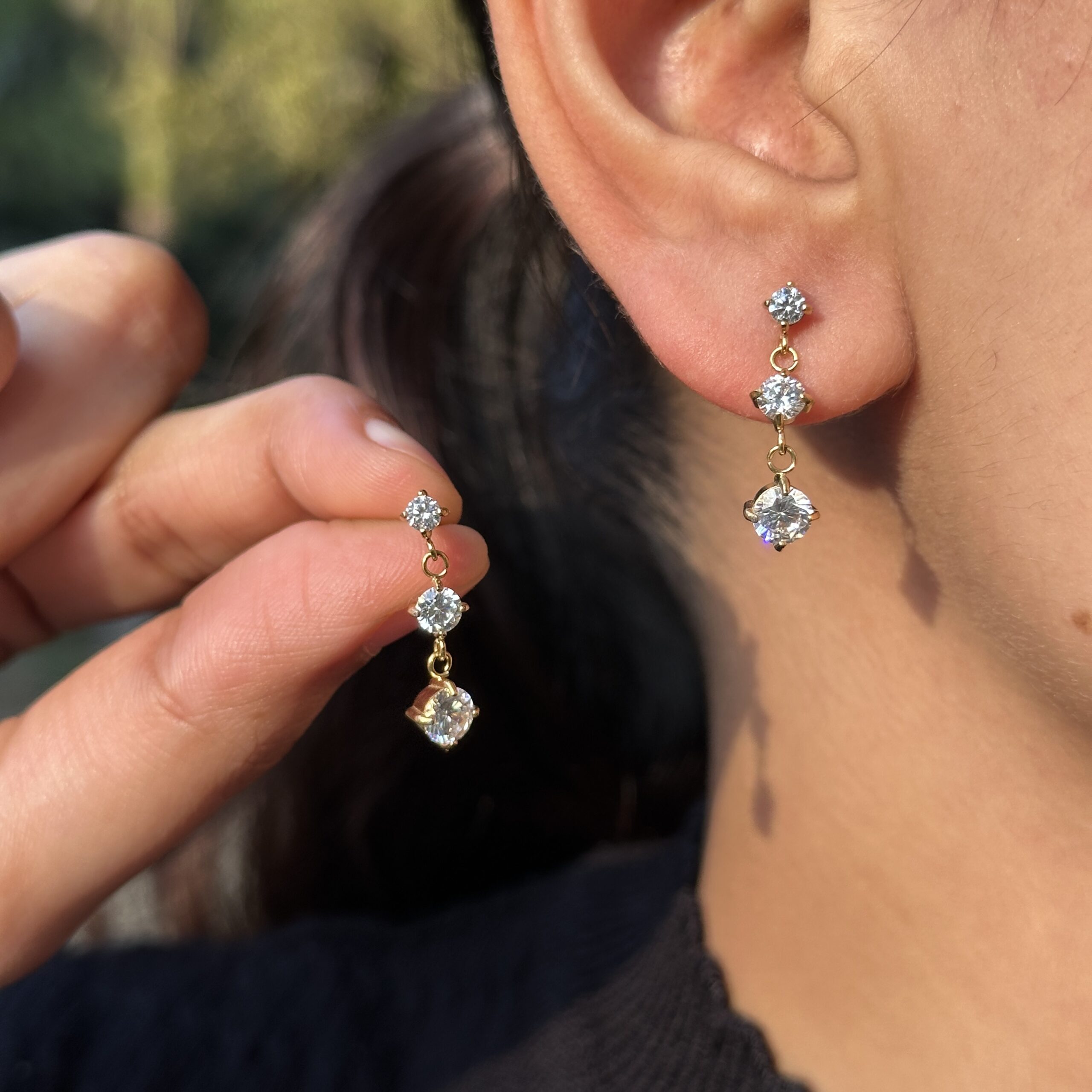 100.1 Triple Solitaire Drop Earrings - Image 1