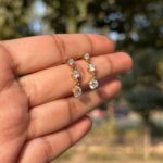 Triple Solitaire Drop Earrings - Image 3